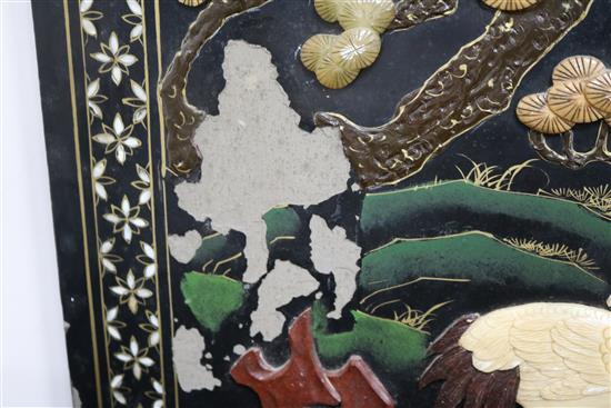 An Oriental four fold lacquer screen W.162cm